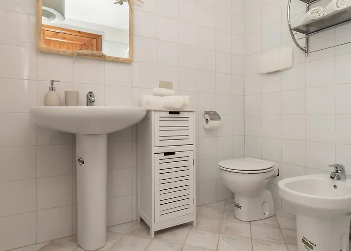 Apartament Cala Liberotto-raffinata Taverna Con Camino